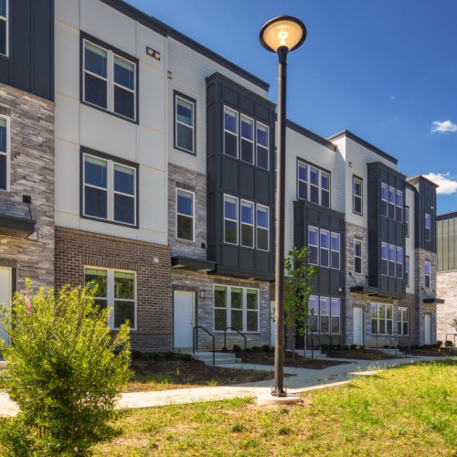 Find your perfect fit at Ainsworth a building with a light post in front of it