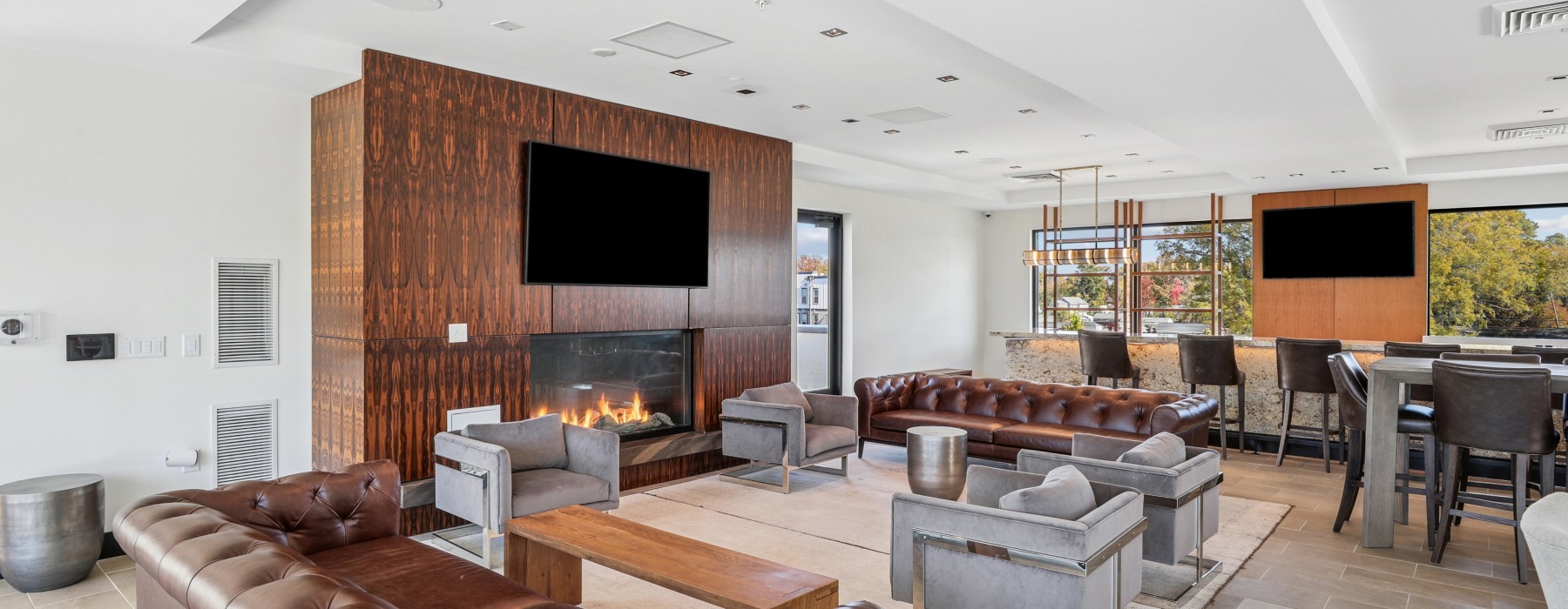 Sophisticated resident lounge with industrial kitchen appliances