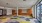a room with a carpet and a rug