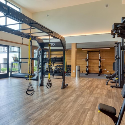 State-of-the-art amenities a gym with exercise equipment